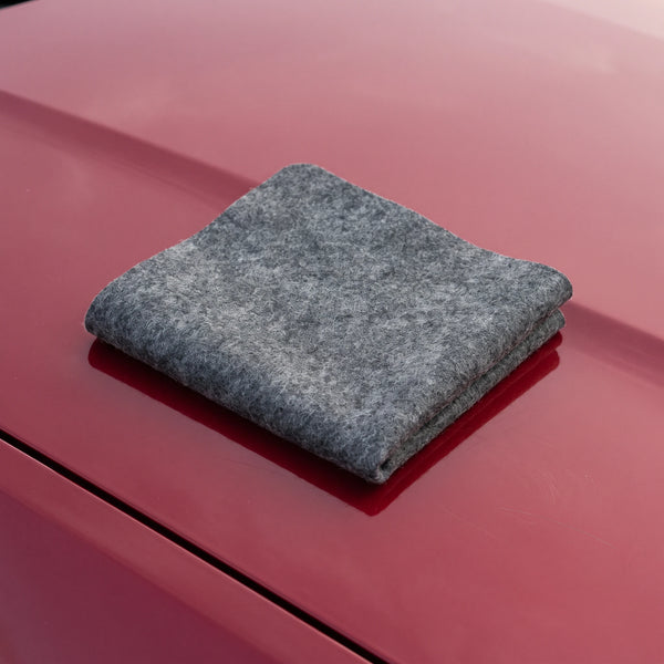 The cloth on a red panel